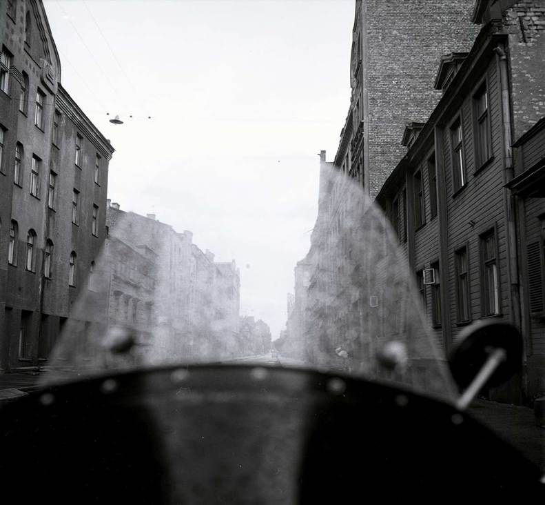 Alexandre Slusarev motorcycle and Rigan architecture Riga 1979